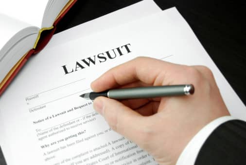 Attorney fills lawsuit paperwork out for Mass Tort Clients