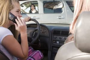 teen on the phone while driving