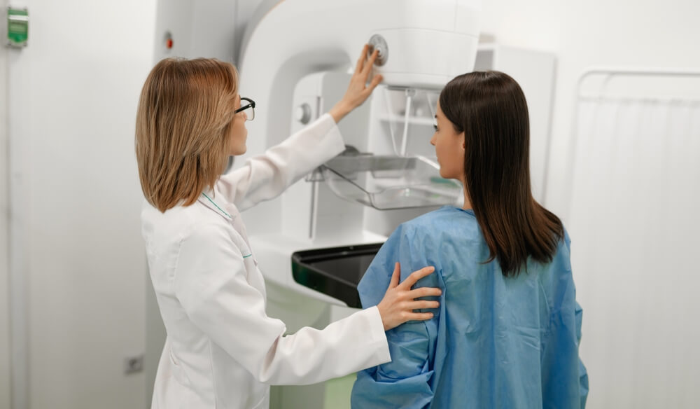 Woman undergoing breast cancer screening to detect false negatives