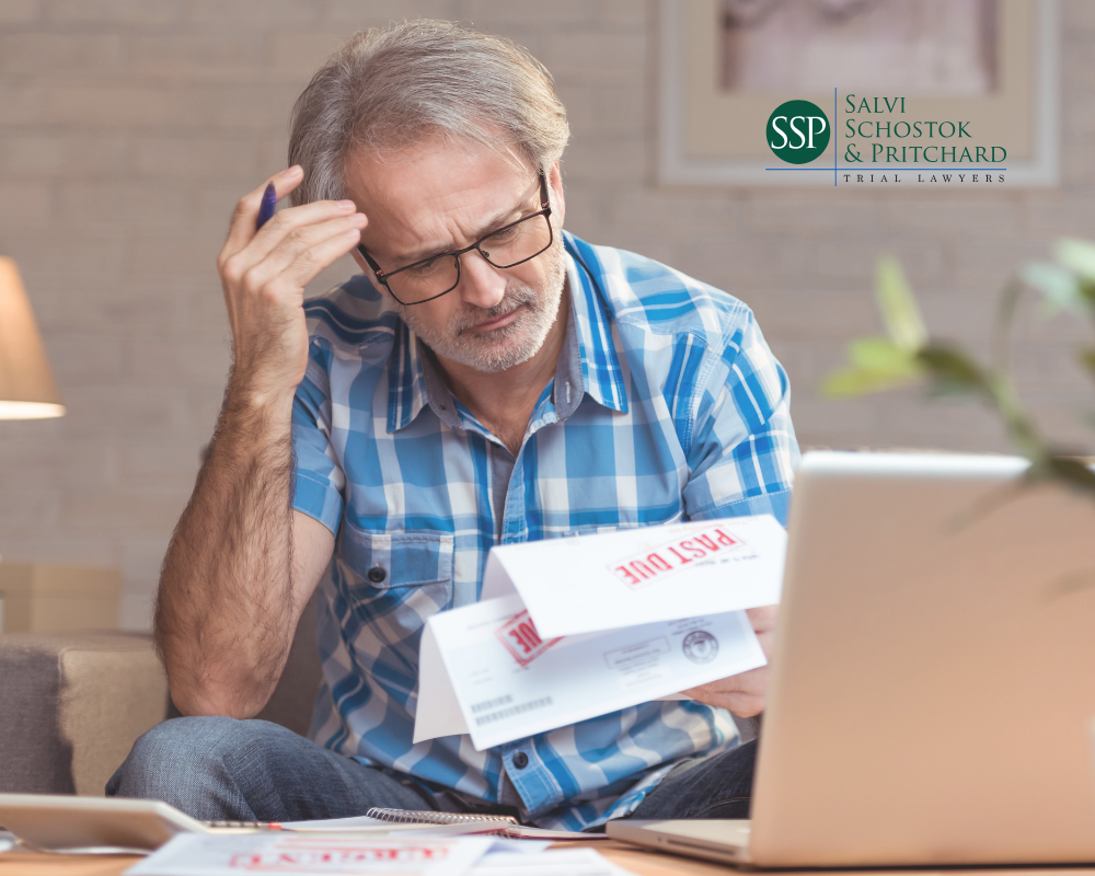 man with past due bill after car accident bills