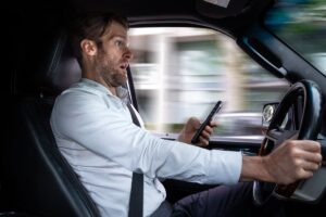 What Happens If You Cause an Accident While Texting